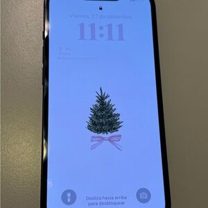 Apple iPhone with Christmas Tree Wallpaper